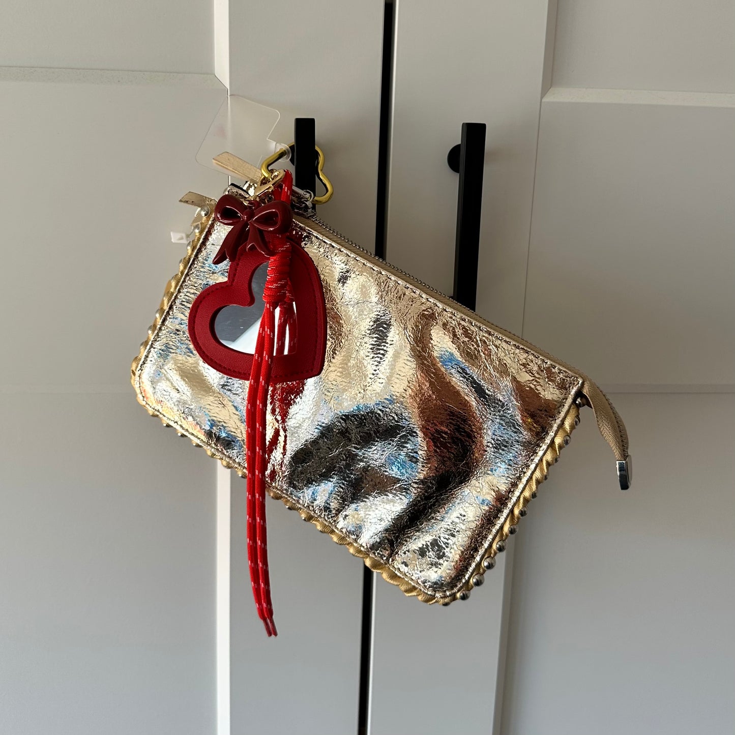 Tas metallic goud